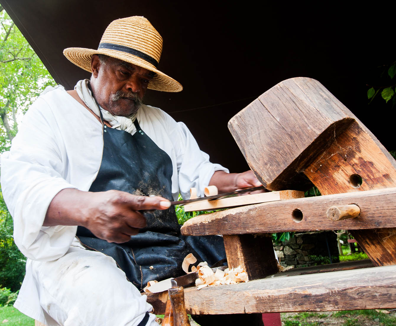 An interpreter demonstrates coopering at Philipsburg Manor